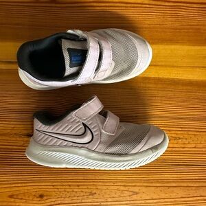 Light pink little girls Nike shoes.  Size 9